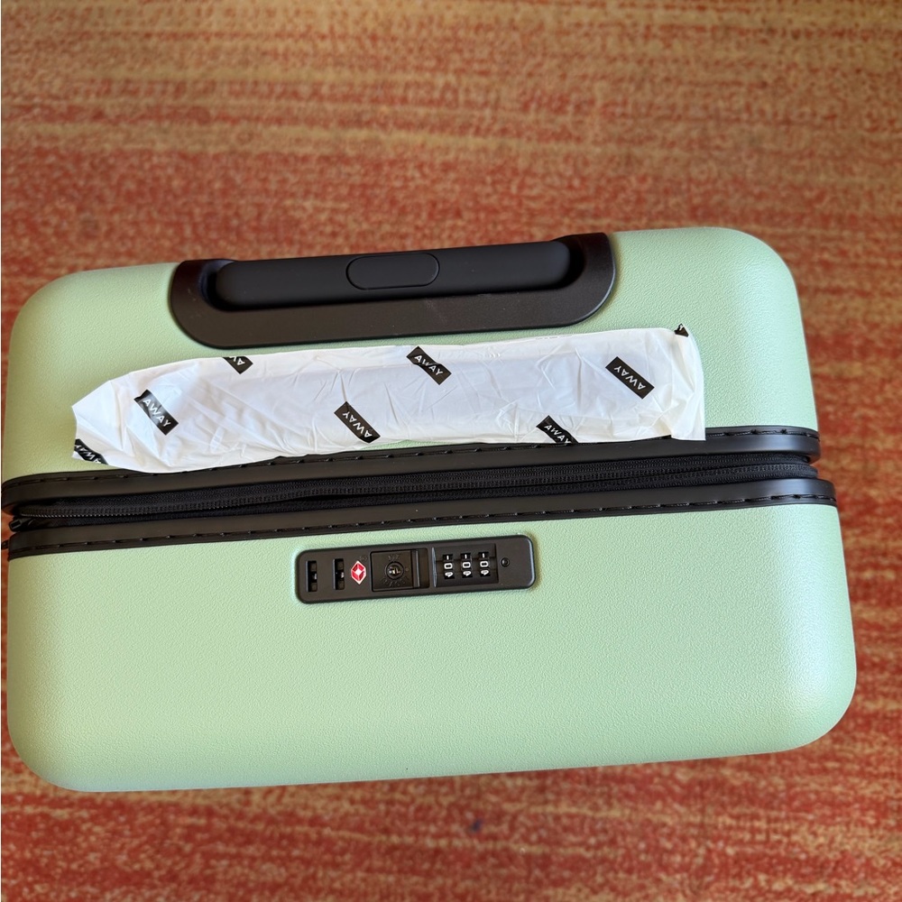 Away Sea Green “ Bigger Carry-On”Luggage currently 295.00 at Away.
